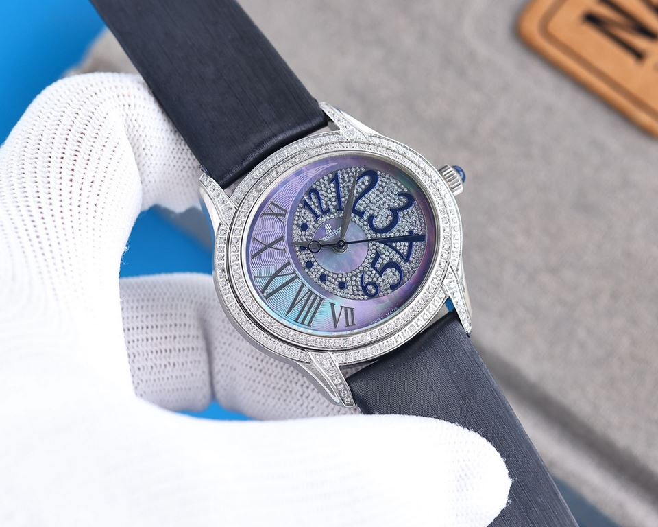 The AP Audemars Piguet Millenary 77303BC unisex watch (35mm) is a gorgeous watch that is full of design and looks great on the wrist. Dial material black mother-of-pearl and white mother-of-pearl dial decorated with a fl