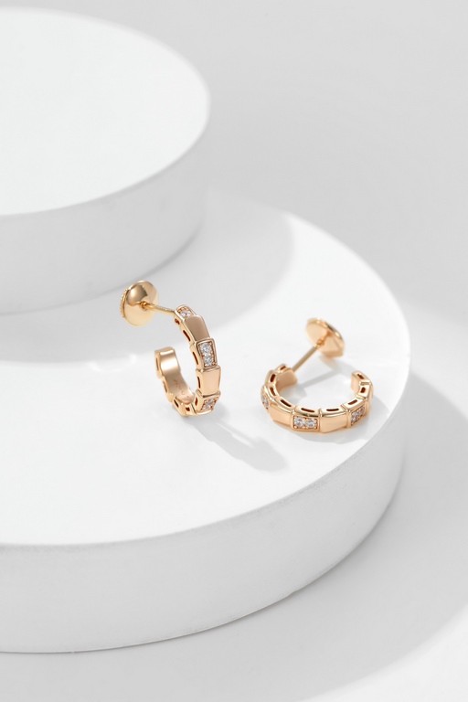 BVSerpentiViper EarringsA seductive and captivating sensuality that pays homage to its spirit animal. Metal and diamonds are spliced with natural stones to give the unique spreading curvature of the spirit snake, with be