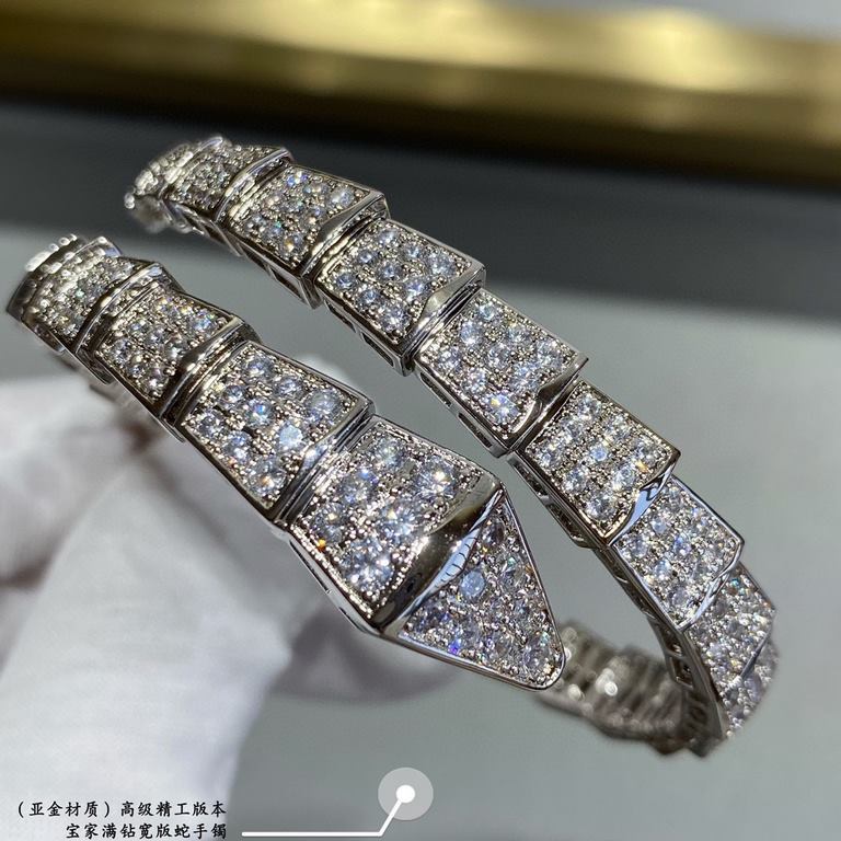 (actual price) in matt gold . PREMIUM FINISHED EDITION BVLGARI Bvlgari Wide Full Diamond Snake Bracelet   The delicate and alluring lines of the design are adorned with brilliant diamonds   so that dominance can also be 