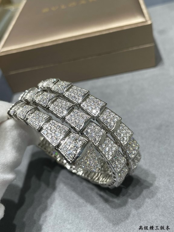 (actual price) in matt gold . PREMIUM FINISHED EDITION BVLGARI Bvlgari Wide Edition Triple Loop Full Diamond Snake Bracelet   The delicate and alluring lines of the design are adorned with brilliant diamonds   so that do