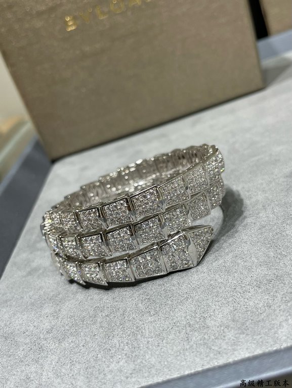 (actual price) in matt gold . PREMIUM FINISHED EDITION BVLGARI Bvlgari Wide Edition Triple Loop Full Diamond Snake Bracelet   The delicate and alluring lines of the design are adorned with brilliant diamonds   so that do