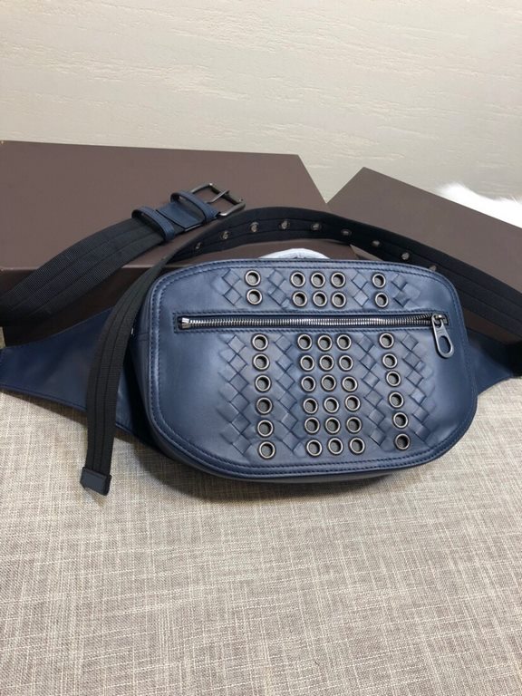 New Crafted Fort Studded Chest Bag   Urbandoc style with novel Micro-Macro crafted design with meticulous attention to detail, presenting a shapely lozenge intrecciato weave pattern. Meticulously crafted in supple fetal 