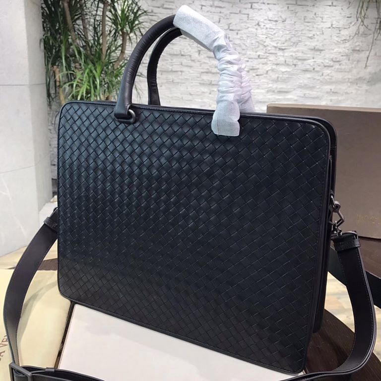 New Briefcase   This Intrecciato woven tire leather briefcase is carefully crafted to be sturdy, durable and elegantly stylish. The shape is classic and structured, with a clean silhouette. The cotton-lined interior feat