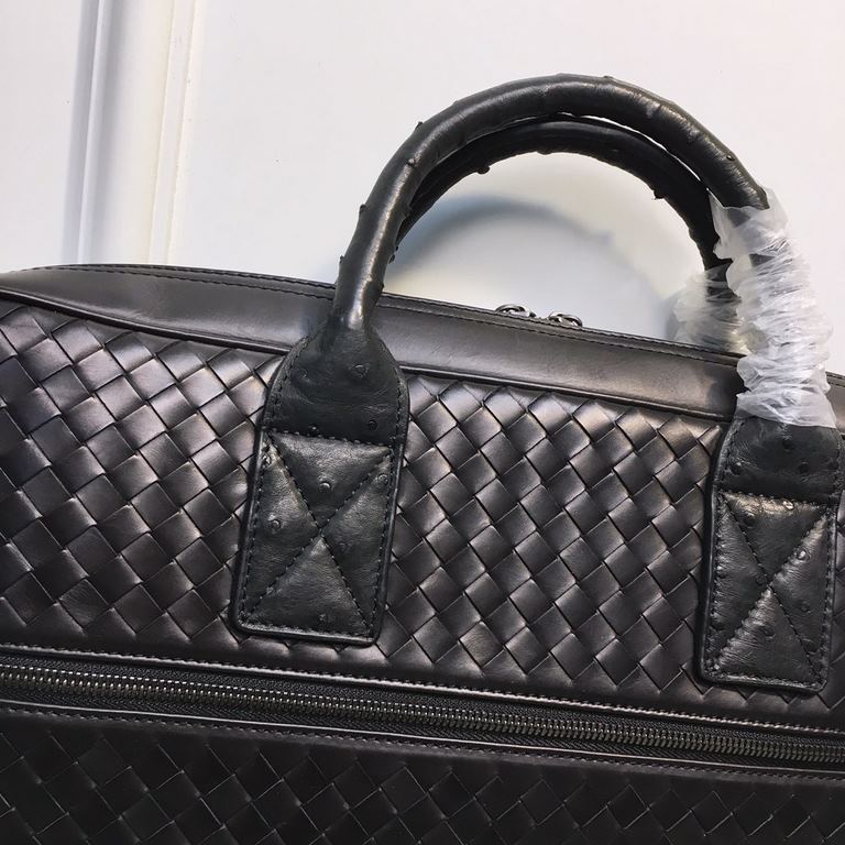 Premium Ostrich Leather Briefcase King  This smooth fetal cowhide quilted ostrich leather briefcase features classic styling with hand-woven details and ostrich leather trim. The fiber interior comes with a double zipper