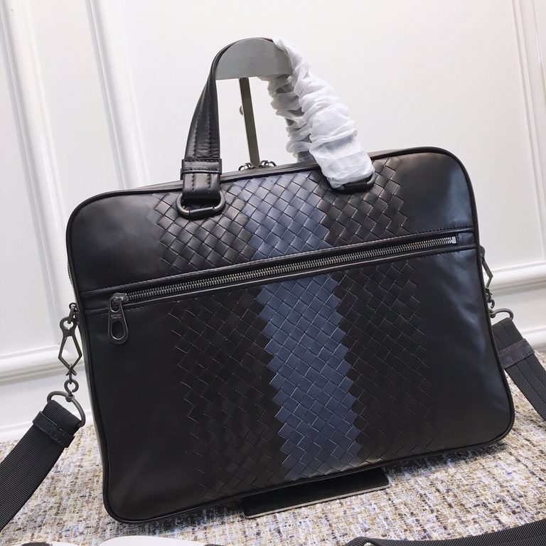 New Briefcase This slim briefcase highlights a beautifully architectural woven pattern that exquisitely blends signature Club craftsmanship with tire leather trim. The result of hours of delicate craftsmanship, this piec