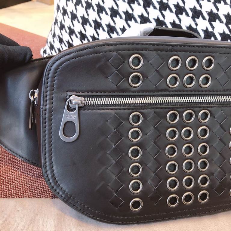 New Crafted Fort Studded Chest Bag   Urbandoc style with novel Micro-Macro crafted design with meticulous attention to detail, presenting a shapely lozenge-shaped intrecciato weave pattern. Crafted from supple cowhide le