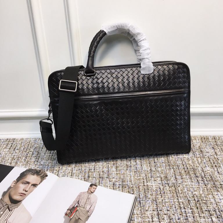 Briefcase   This practical briefcase is meticulously hand-woven and crafted from fetal cowhide leather for a lightweight look that easily organizes all of your daily essentials, from documents to a laptop. The design is 