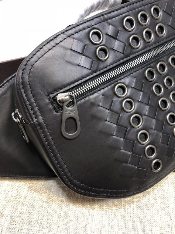 New Crafted Fort Studded Chest Bag   Urbandoc style with novel Micro-Macro crafted design with meticulous attention to detail, presenting a shapely lozenge intrecciato weave pattern. Meticulously crafted in supple fetal 