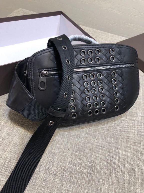 New Crafted Fort Studded Chest Bag   Urbandoc style with novel Micro-Macro crafted design with meticulous attention to detail, presenting a shapely lozenge intrecciato weave pattern. Meticulously crafted in supple fetal 