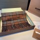 A warm and cozy scarf in soft cashmere. One side is adorned with a Burberry check pattern, while the other features a solid color design and the brand's logo. Produced in a 200-year-old specialist workshop in the Scottis