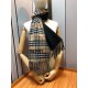 Burberry Burberry - Reversible Dual Purpose Checked Cashmere Scarf  2023 The newest model of the pop-up, cozy scarf, made of soft cashmere fabric, produced in a traditional Scottish workshop with a long history of 200 ye