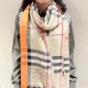 A lightweight scarf crafted by Burberry in checkered cashmere; the edges are trimmed with delicate silk tassels. Product details 70x200 cashmere   mulberry silk, rectangular shape with fringes on both ends