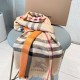 A lightweight scarf crafted by Burberry in checkered cashmere; the edges are trimmed with delicate silk tassels. Product details 70x200 cashmere   mulberry silk, rectangular shape with fringes on both ends