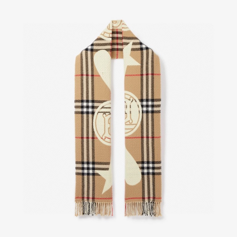 Burberry's Italian-made scarf is crafted from a soft wool-cashmere blend for superior tactility and warmth. Decorated with the exclusive Thomas Burberry logo and decorated with stars and hearts.205 x 40cm