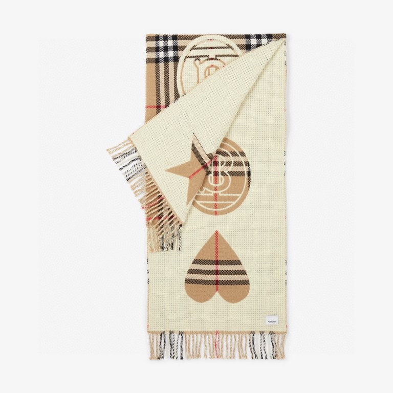 Burberry's Italian-made scarf is crafted from a soft wool-cashmere blend for superior tactility and warmth. Decorated with the exclusive Thomas Burberry logo and decorated with stars and hearts.205 x 40cm