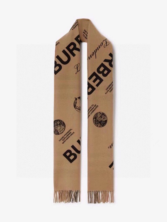 Burberry - Reversible Dual Purpose Label Print Cashmere Scarf    Italian-made scarf crafted from soft cashmere. One side is adorned with Burberry check and the other with a label print that pays homage to the brand's his