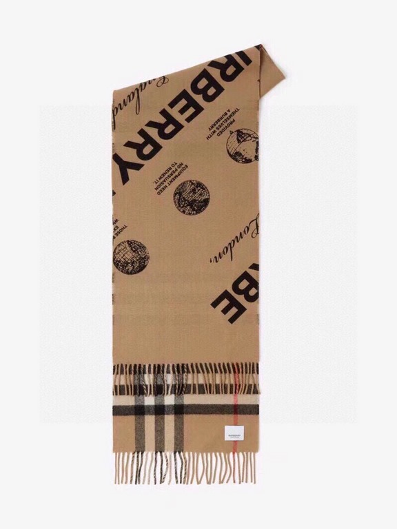 Burberry - Reversible Dual Purpose Label Print Cashmere Scarf    Italian-made scarf crafted from soft cashmere. One side is adorned with Burberry check and the other with a label print that pays homage to the brand's his