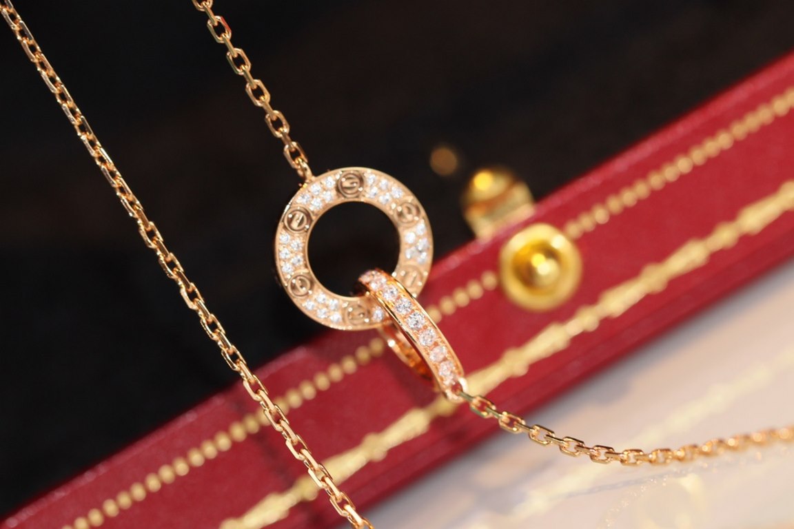 Cartier Necklace Classic Love full diamond big cake double ring necklace. Classic big brand work, the round cake, screws, full of diamonds in one, one side full of diamonds, one side without diamonds, is a very hot one i