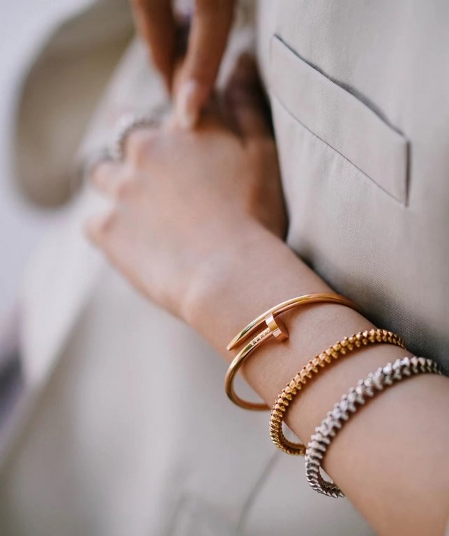 Cartier's Clash de Cartier studded bracelet   The combination of studs and beads plays with geometric elements   exquisite craftsmanship to present a rounded beauty Double charms in which   quietly wear the same style wi