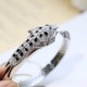 Cartier Spotted Fancy Diamond Leopard BraceletSet with 360! Round brilliant cut diamonds. Emerald, Onyx   The cheetah - as Cartier's iconic animal figure - first appeared in 1914. Louis Cartier was the first to use the c