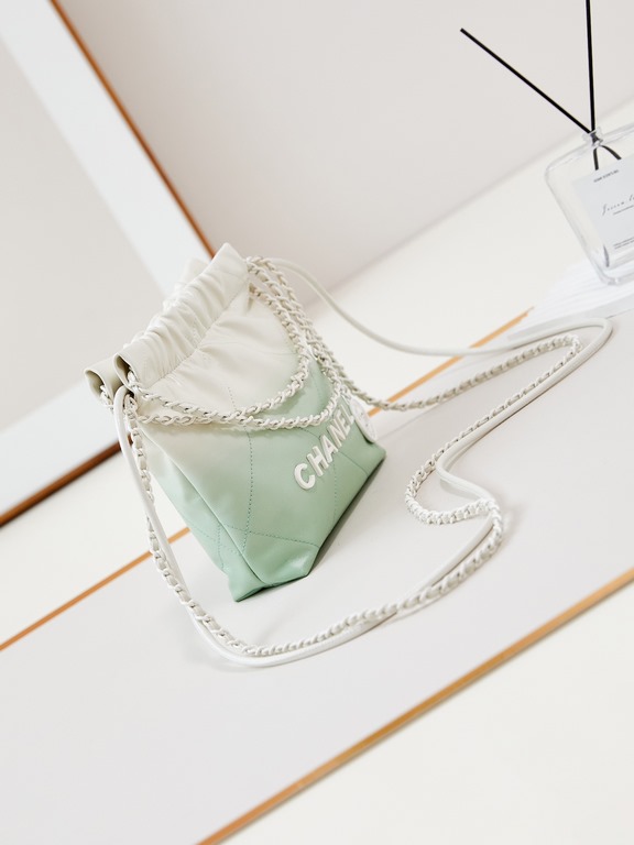 24S New mini 22bagIt's so pretty in this color! Small and exquisite, exudes unparalleled high-level luxury, irresistible, as if it were a finely crafted work of art, porcelain!CHANEL letters embellishment, glittering, th