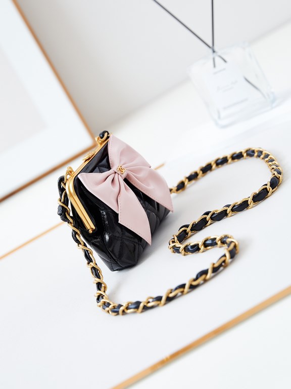 24A Bow Froggy Bags are so cute, the froggy clip bag holds tissues, lipstick, powder, and oil-waxed sheepskin which is very good for wear and tear, and can be used as a dinner bag. The shoulder strap has an intricate eng