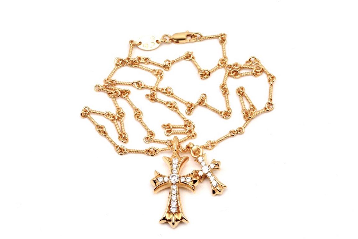 Crocentric 22k Gold Plated Double Cross NecklaceThe material 925 is vacuum plated to preserve the color for a long time Version of the counter 22k counterpart.The lettering and inlay method is the same. The difference be