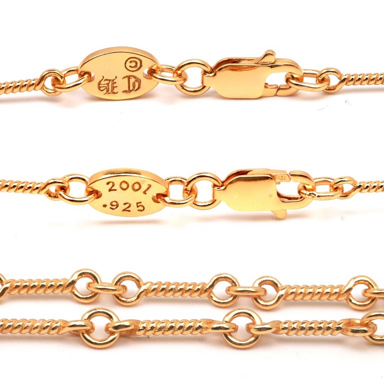 Crocentric 22k Gold Plated Double Cross NecklaceThe material 925 is vacuum plated to preserve the color for a long time Version of the counter 22k counterpart.The lettering and inlay method is the same. The difference be