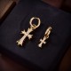 Krohheart cross earrings   Krohheart this brand is not very familiar, but this brand in the United States is exceptionally hot   China's many rich second-generation is also a brand follower   The brand was initially silv