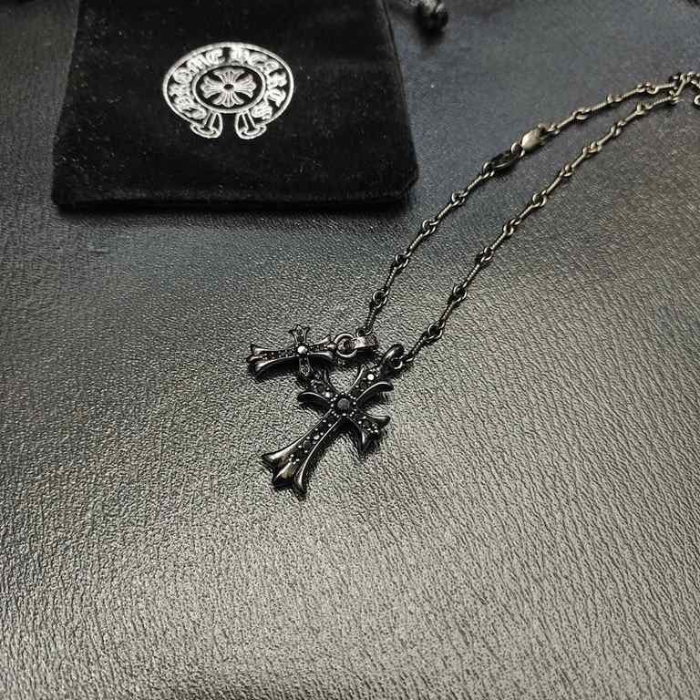 Crocus Black Silver Double Cross NecklaceElectroplated black with multiple layers of vacuum platingThe effect on the body is very good Hot models Cost-effective!