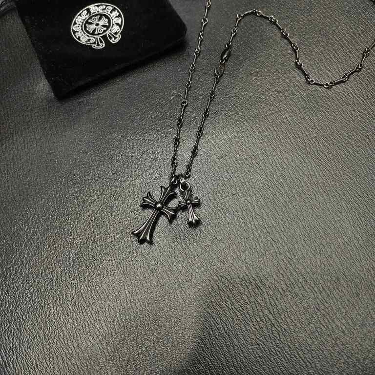 Crocus Black Silver Double Cross NecklaceElectroplated black with multiple layers of vacuum platingThe effect on the body is very good Hot models Cost-effective!