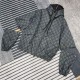 P505 GG Nylon Gingham Jacket w Detachable SleevesSize S-XLGucci's Spring 2024 collection draws inspiration from cool seasonal colors and textures for a new urban look. This casual jacket is crafted from gray and black GG