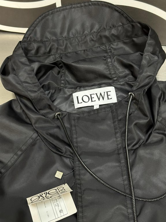 p505 LOEWE Loewe Nylon Hooded JacketMade of medium-weight, water-resistant, compact, glossy nylon, hooded collar with visor and leather drawstring, raglan sleeves with hidden ribbed knit cuffs, Anagram embroidery at hem,