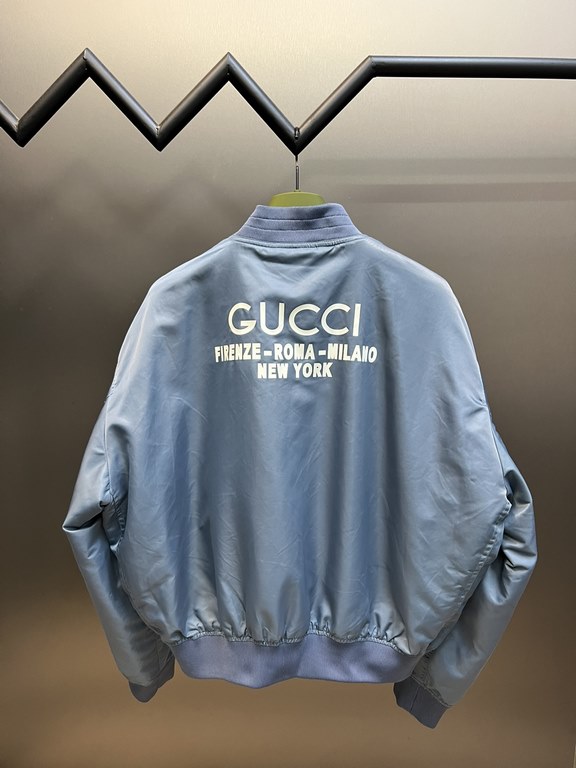 p455 Gucci Eung Lei same letter print color collision baseball jerseyCrafted from blueblack nylon, this aviator jacket features a color-blocked print on the back for a subtle fashion aesthetic. Featuring a padded lining,