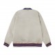 P430 Guci 2023FW New FallWinterReversible jacket with long sleeves and collarNavy blue GG nylon canvas on one sideBeige nylon canvas on the other sideColor-coded ribbed pipingBrand logo embroideryMetal zipper closure wit