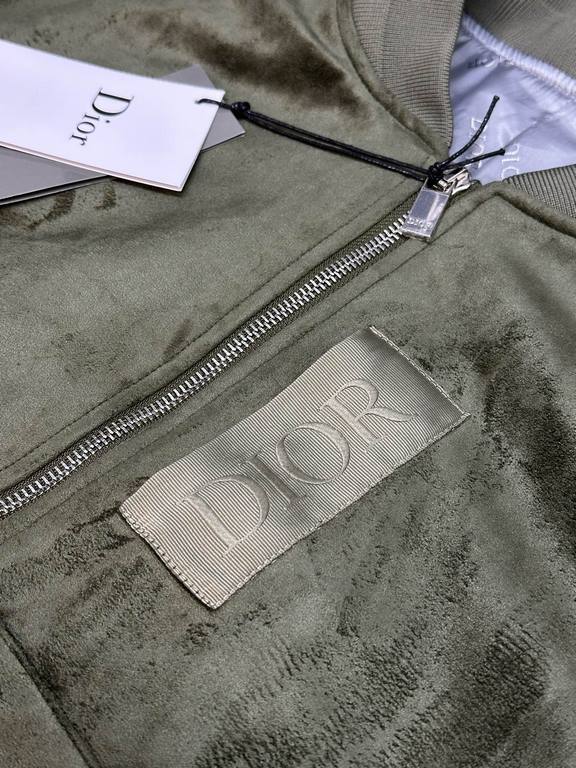 550 Dior Dior Colorblocked Rattan Check Short JacketCrafted from beige leather, the tech-fabric sleeves are adorned with rattan check and ribbed detailing, a beige patch at the chest and patch pockets at the front. The z