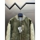 550 Dior Dior Colorblocked Rattan Check Short JacketCrafted from beige leather, the tech-fabric sleeves are adorned with rattan check and ribbed detailing, a beige patch at the chest and patch pockets at the front. The z