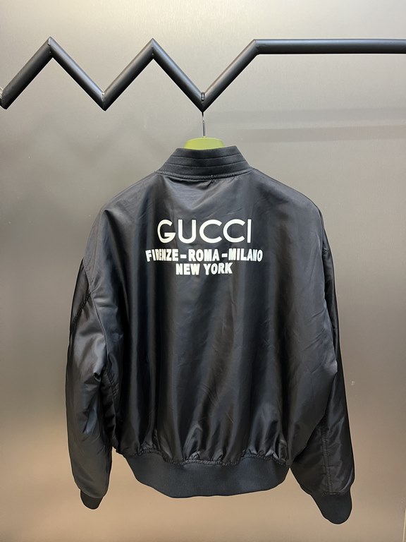 p455 Gucci Eung Lei same letter print color collision baseball jerseyCrafted from blueblack nylon, this aviator jacket features a color-blocked print on the back for a subtle fashion aesthetic. Featuring a padded lining,