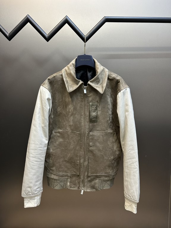 p500 Dior Dior Zipper Short JacketThis collegiate-inspired zipped short jacket combines different materials, colors and textures to create a contrasting silhouette. Crafted from brown cowhide leather, the tech-fabric sle