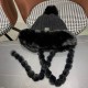 Dior Dior fall and winter new cute hairball tie ear protection cap warm thunderbolt hat female padded thickened knitted wool hat