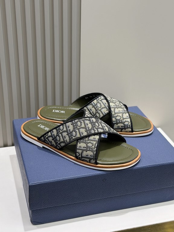 Dior Alias Men's Leather SlippersNew for summer, these Alias sandals make a statement of casual elegance. Crafted from grained cowhide leather, Oblique print fabric and cowhide lining! Cross-strap design with metal overl