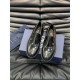 D~r  Men's Classic Loafers are designed in a slip-on style for easy on and off. Meticulously crafted from black cowhide leather, they're crafted in collaboration with Shawn Stussy and feature a rubberized, embossed sole 