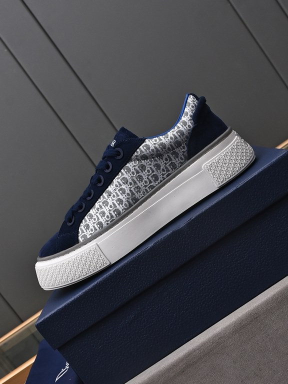 P Dio~r   A fresh take on the classic tennis shoe, the B33 sneaker is a sleek silhouette with a chunky texture. Crafted from cowhide leather with an Oblique print, they feature a padded tongue with Dior logo, wide mohair