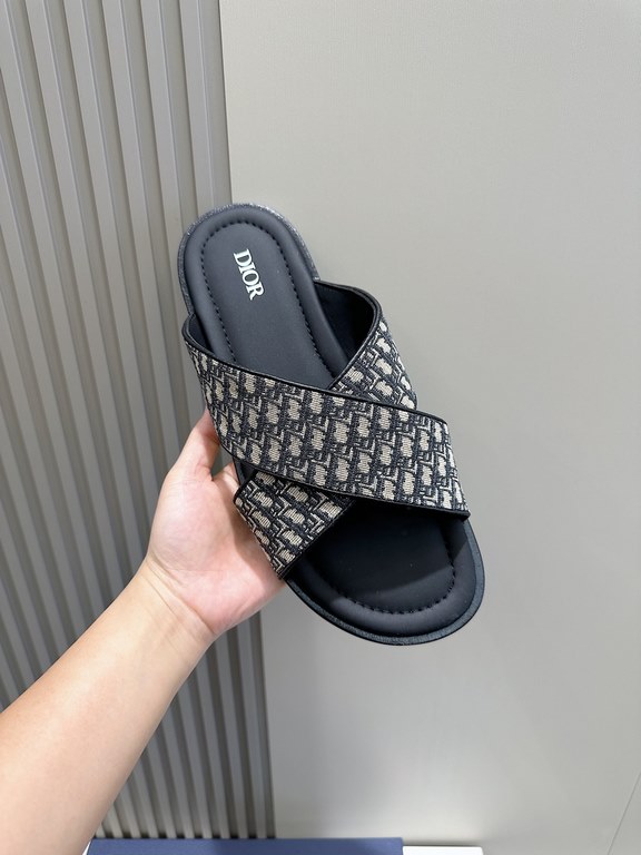 Dior Alias Men's Leather SlippersNew for summer, these Alias sandals make a statement of casual elegance. Crafted from grained cowhide leather, Oblique print fabric and cowhide lining! Cross-strap design with metal overl