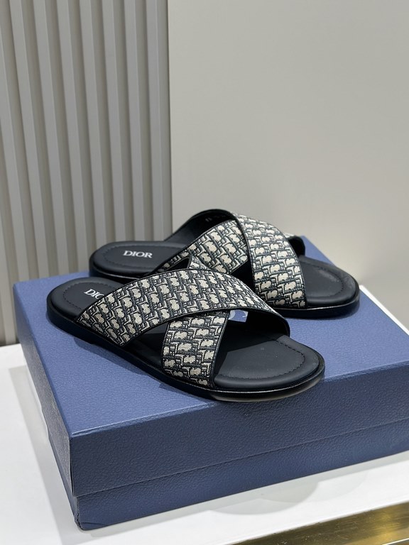 Dior Alias Men's Leather SlippersNew for summer, these Alias sandals make a statement of casual elegance. Crafted from grained cowhide leather, Oblique print fabric and cowhide lining! Cross-strap design with metal overl