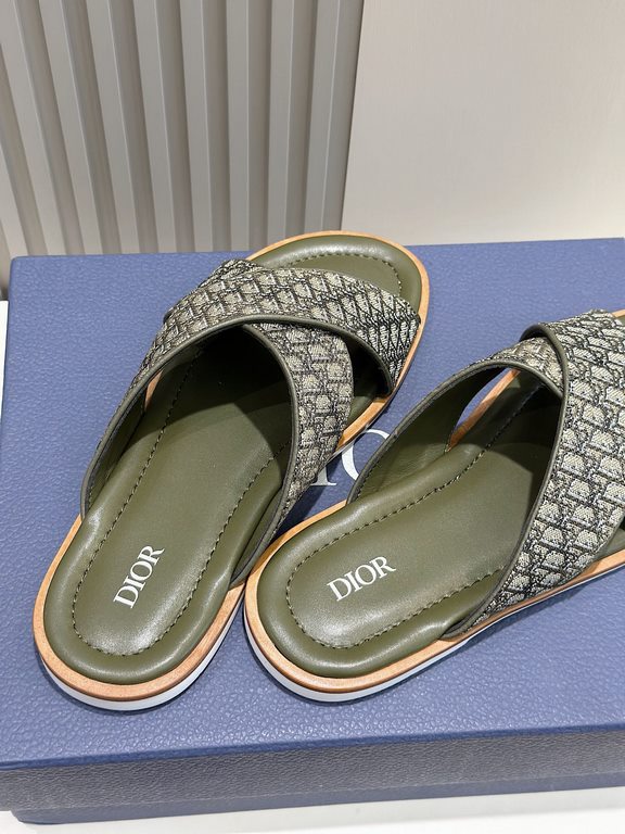 Dior Alias Men's Leather SlippersNew for summer, these Alias sandals make a statement of casual elegance. Crafted from grained cowhide leather, Oblique print fabric and cowhide lining! Cross-strap design with metal overl