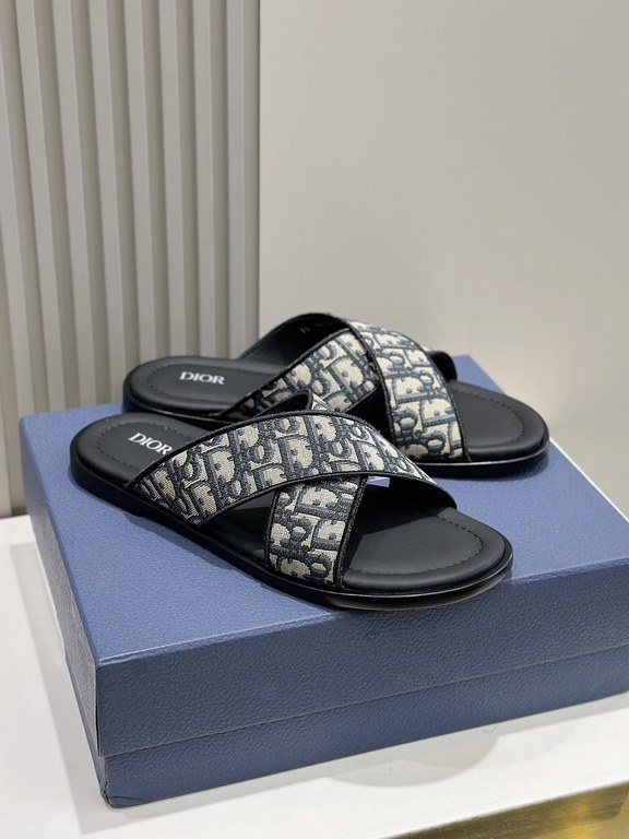 Dior Alias Men's Leather SlippersNew for summer, these Alias sandals make a statement of casual elegance. Crafted from grained cowhide leather, Oblique print fabric and cowhide lining! Cross-strap design with metal overl