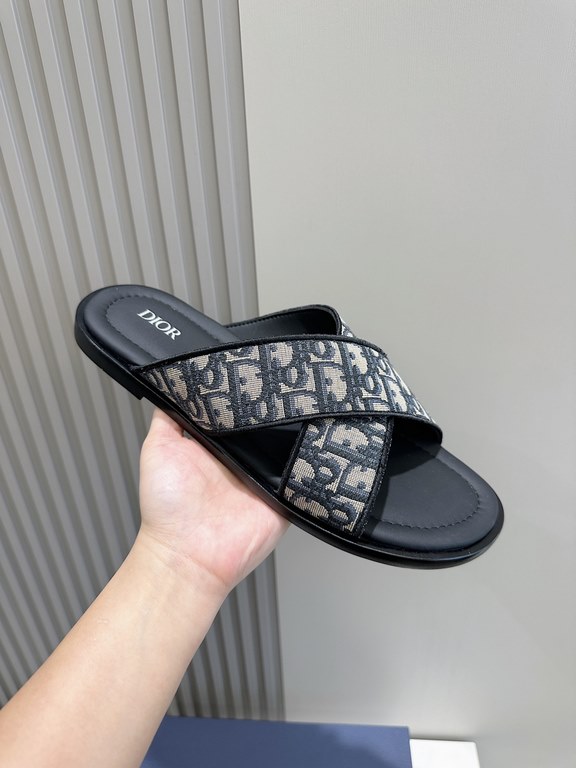 Dior Alias Men's Leather SlippersNew for summer, these Alias sandals make a statement of casual elegance. Crafted from grained cowhide leather, Oblique print fabric and cowhide lining! Cross-strap design with metal overl