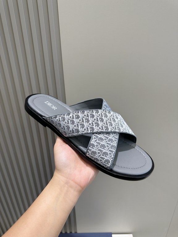 Dior Alias Men's Leather SlippersNew for summer, these Alias sandals make a statement of casual elegance. Crafted from grained cowhide leather, Oblique print fabric and cowhide lining! Cross-strap design with metal overl