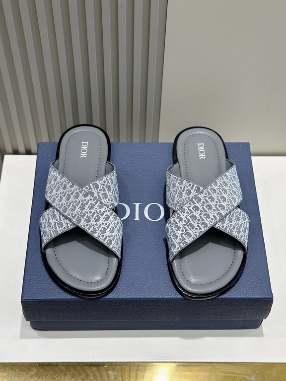 Dior Alias Men's Leather SlippersNew for summer, these Alias sandals make a statement of casual elegance. Crafted from grained cowhide leather, Oblique print fabric and cowhide lining! Cross-strap design with metal overl